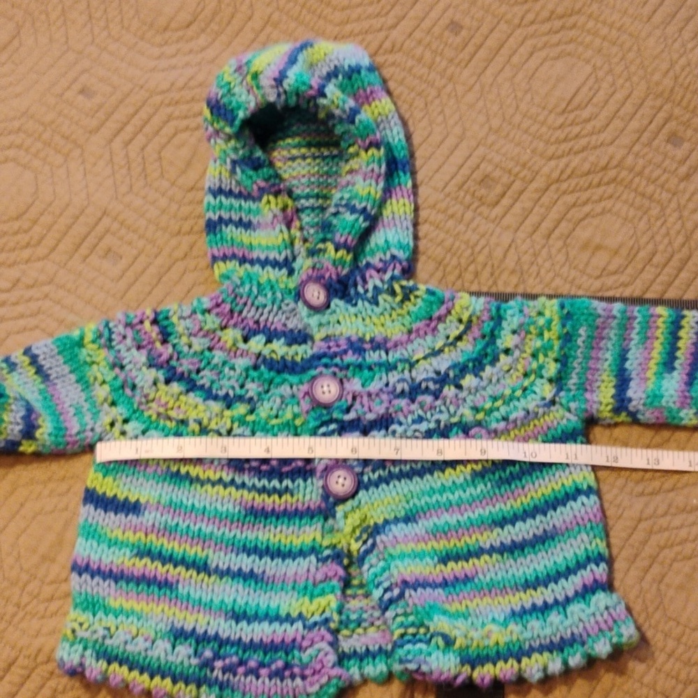 Knitted infant sweater, beautiful multicolor